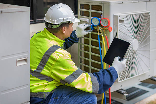Professional Hvac Installation technician working in Olive Branch, MS